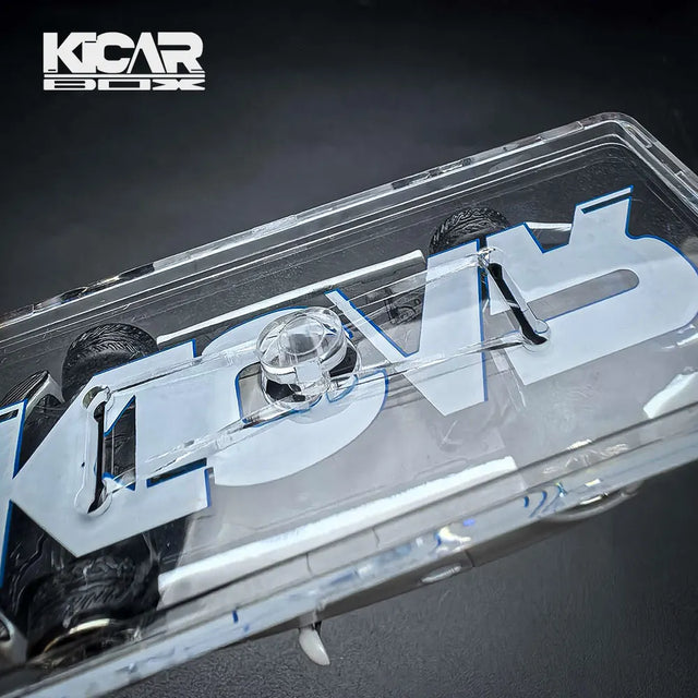 Close-up of a 1:64 diecast car sealed inside the clear, scratch-resistant KicarBox shell